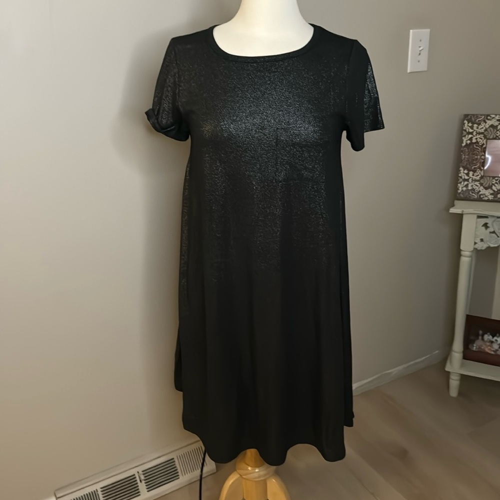 Black/silver shimmer dress. Small, but runs large. Excellent condition.